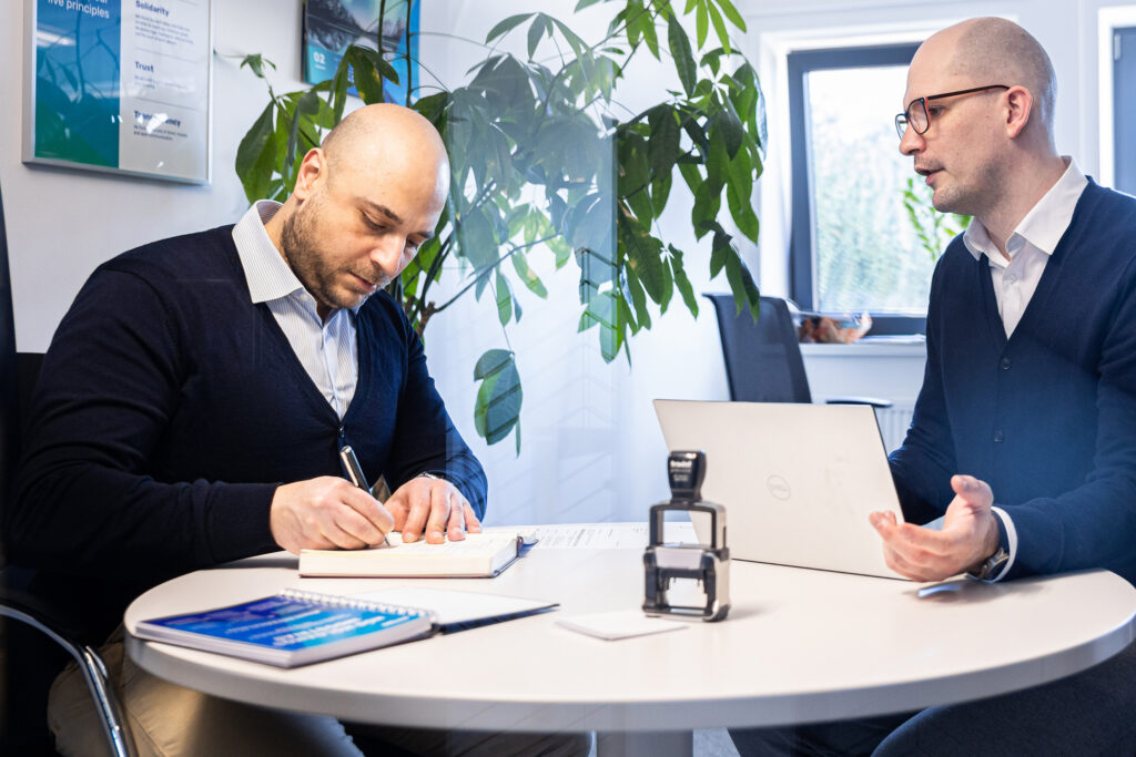 Office team collaborating on a project during a workplace meeting